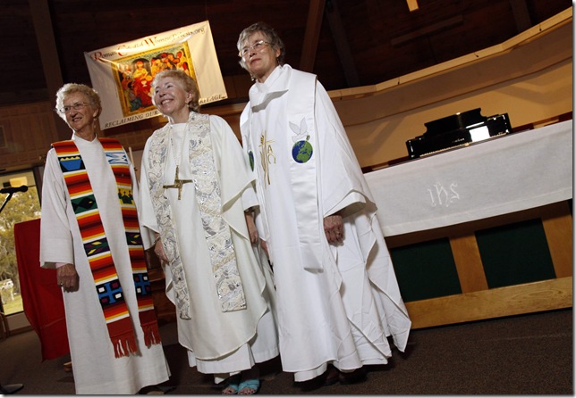 Bishop Bridget (center) and two new womenpriests